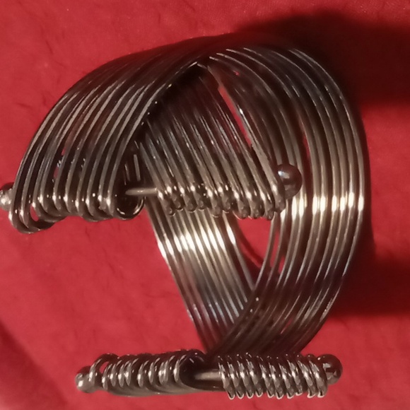 Blackened cuff  adjustable multi layered criss cross pattern. - Picture 3 of 4
